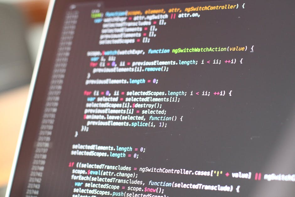Close-up image of a computer screen displaying a code editor with multicoloured programming code. The code appears to be JavaScript, featuring functions, variables, and syntax highlighting in shades o